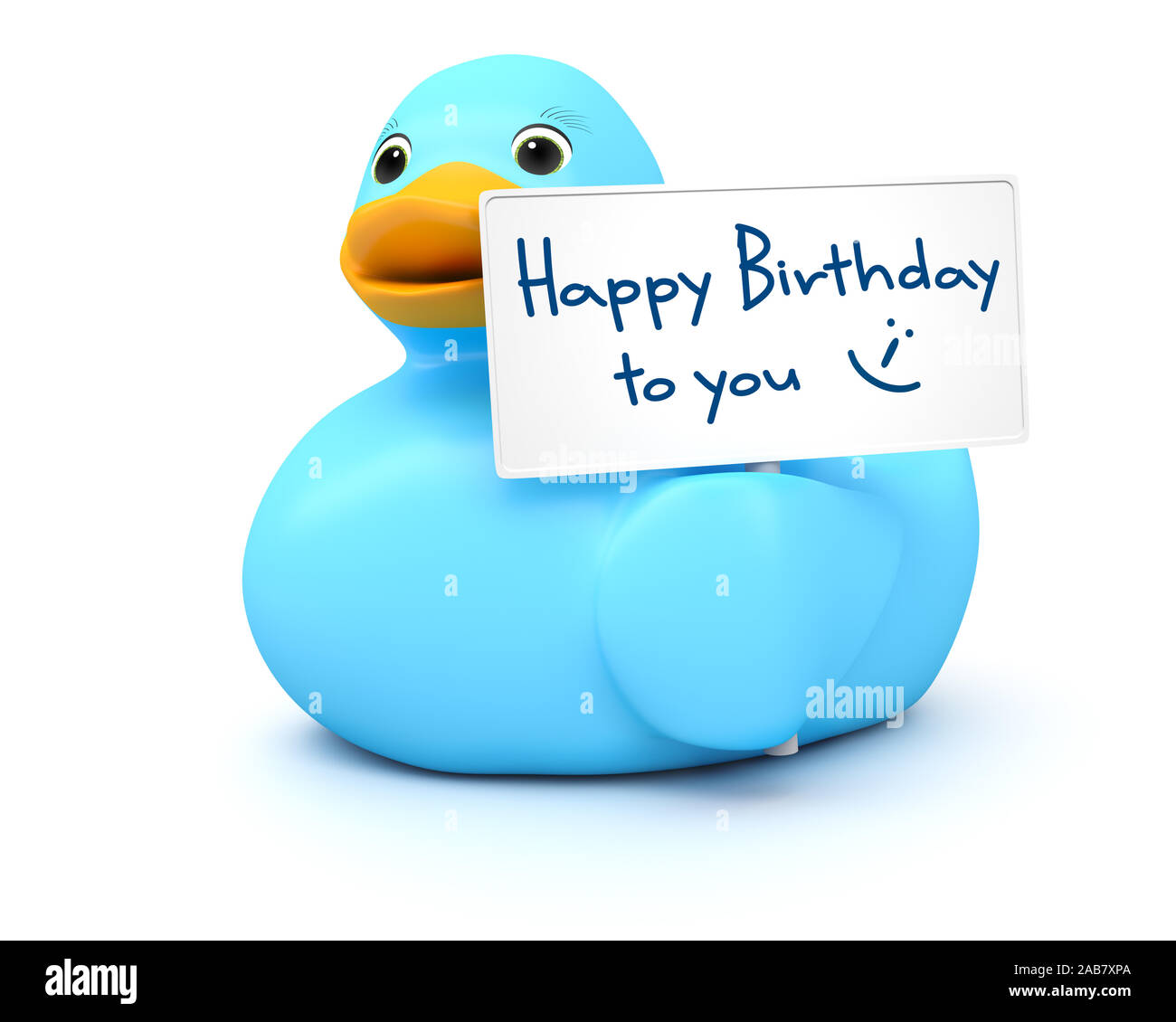 Eine blaue Badeente vor weissem Grund, die ein Schild mit der Aufschrift 'Happy Birthday to you' haelt Stock Photo