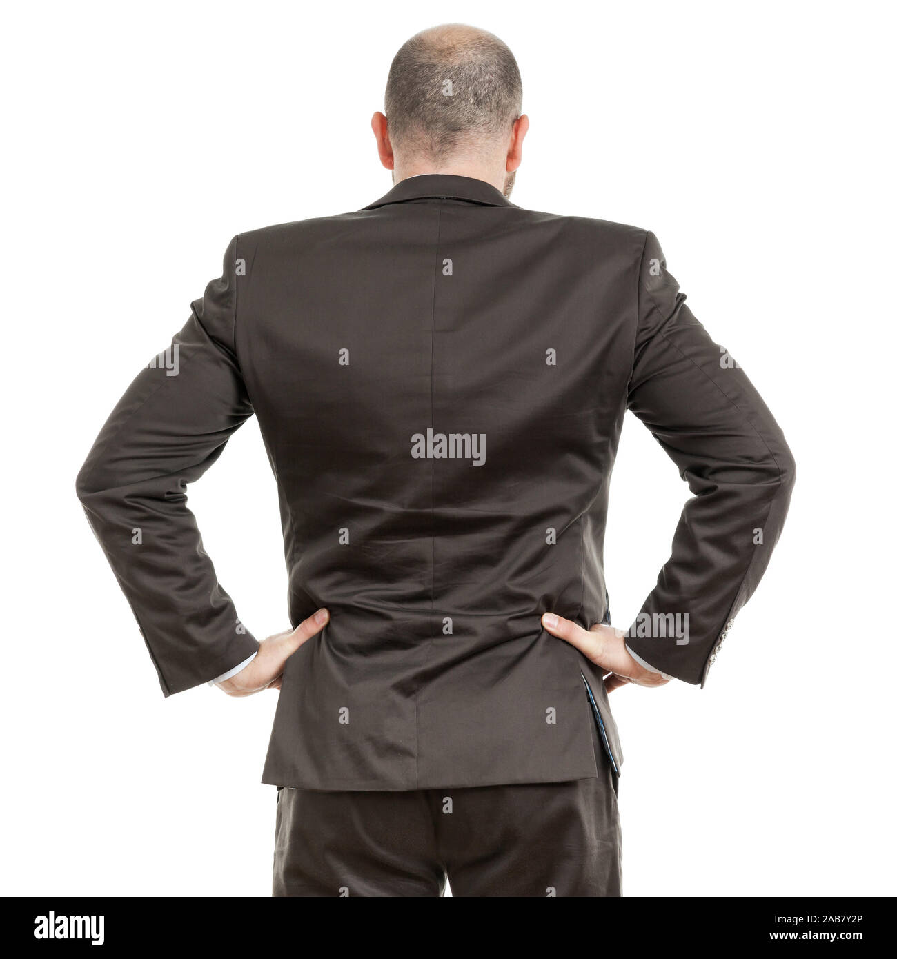 Ein motivierter Geschaeftsmann vor weissem Hintergrund Stock Photo