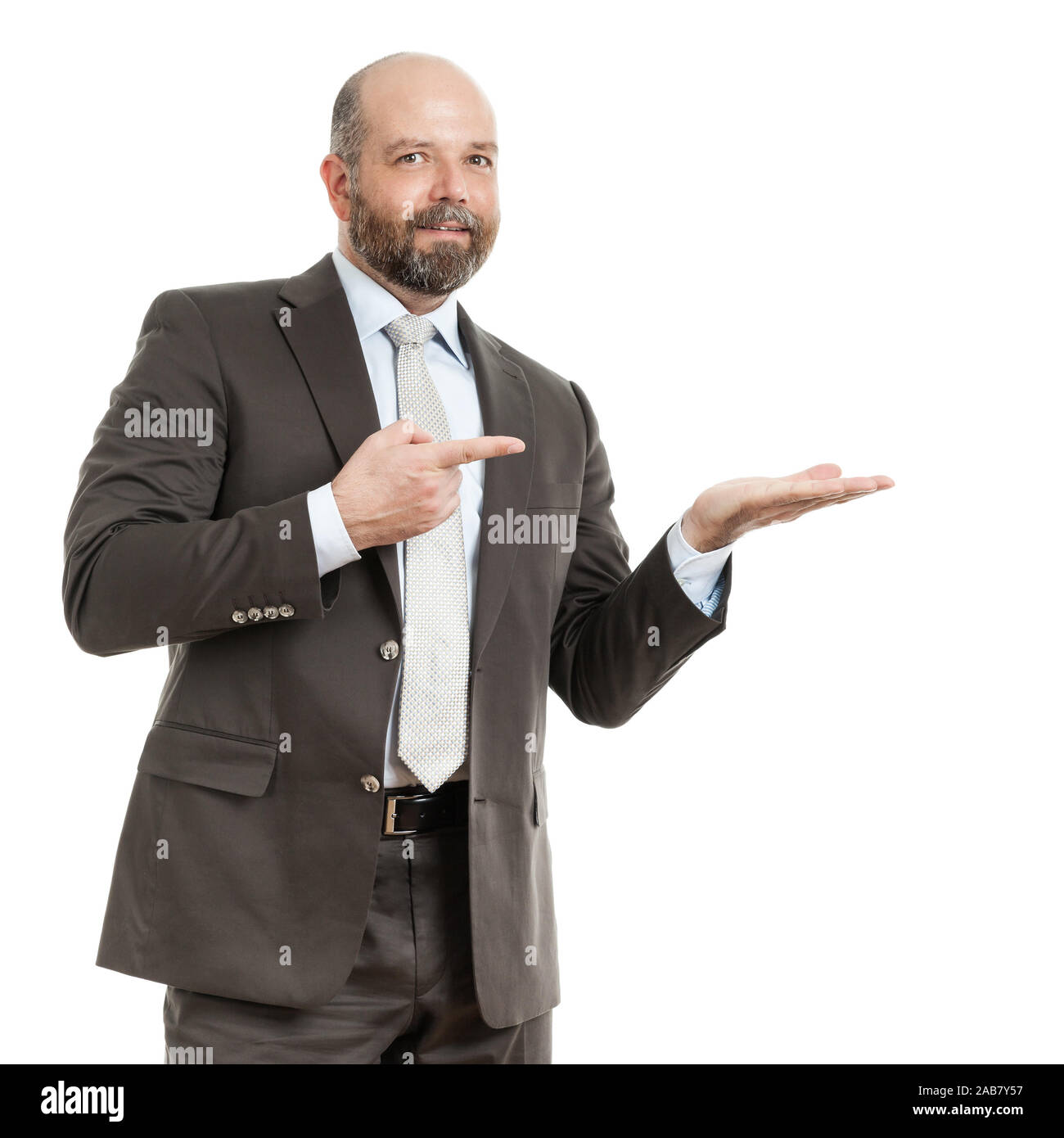 Ein motivierter Geschaeftsmann vor weissem Hintergrund Stock Photo