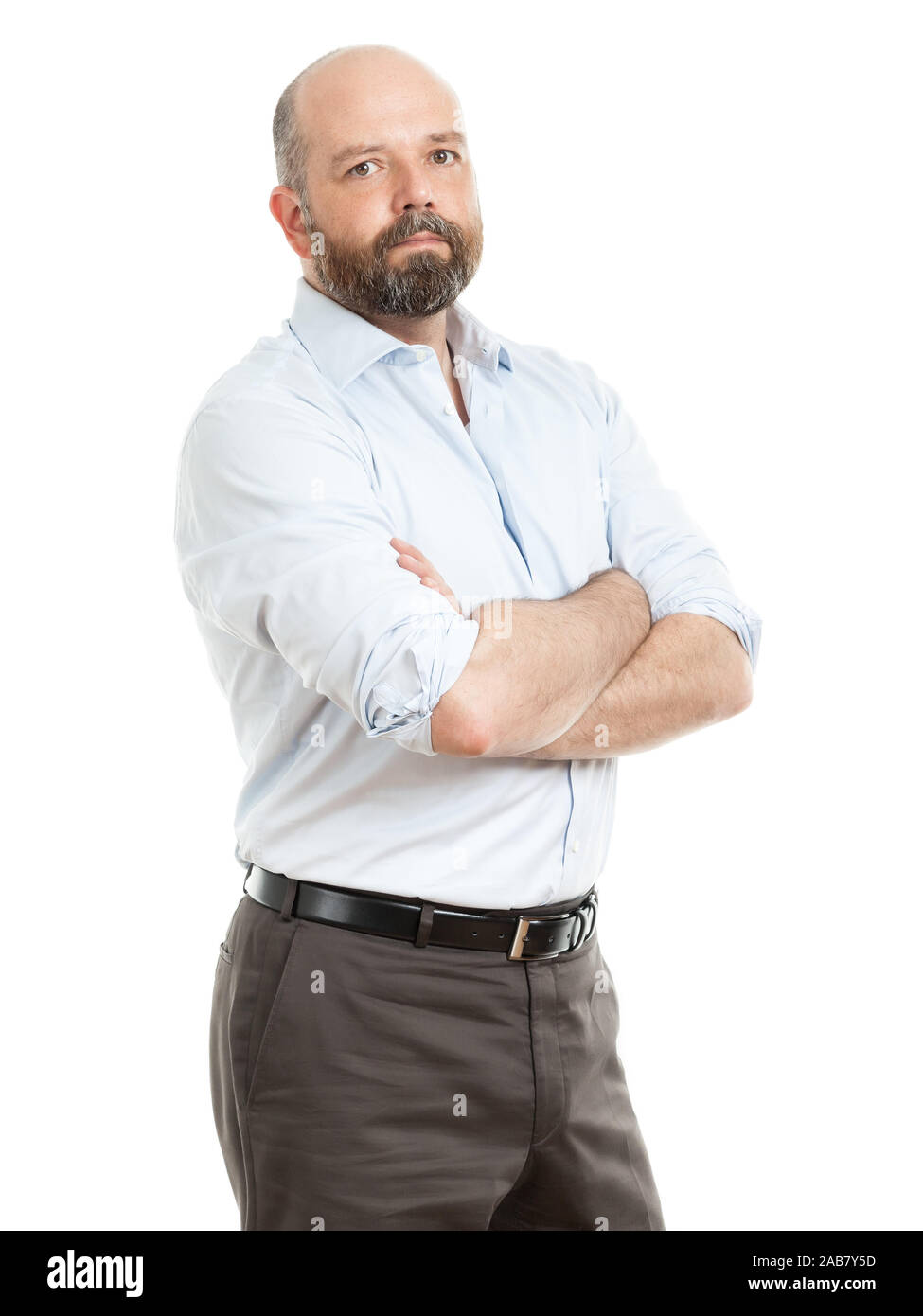 Ein motivierter Geschaeftsmann vor weissem Hintergrund Stock Photo