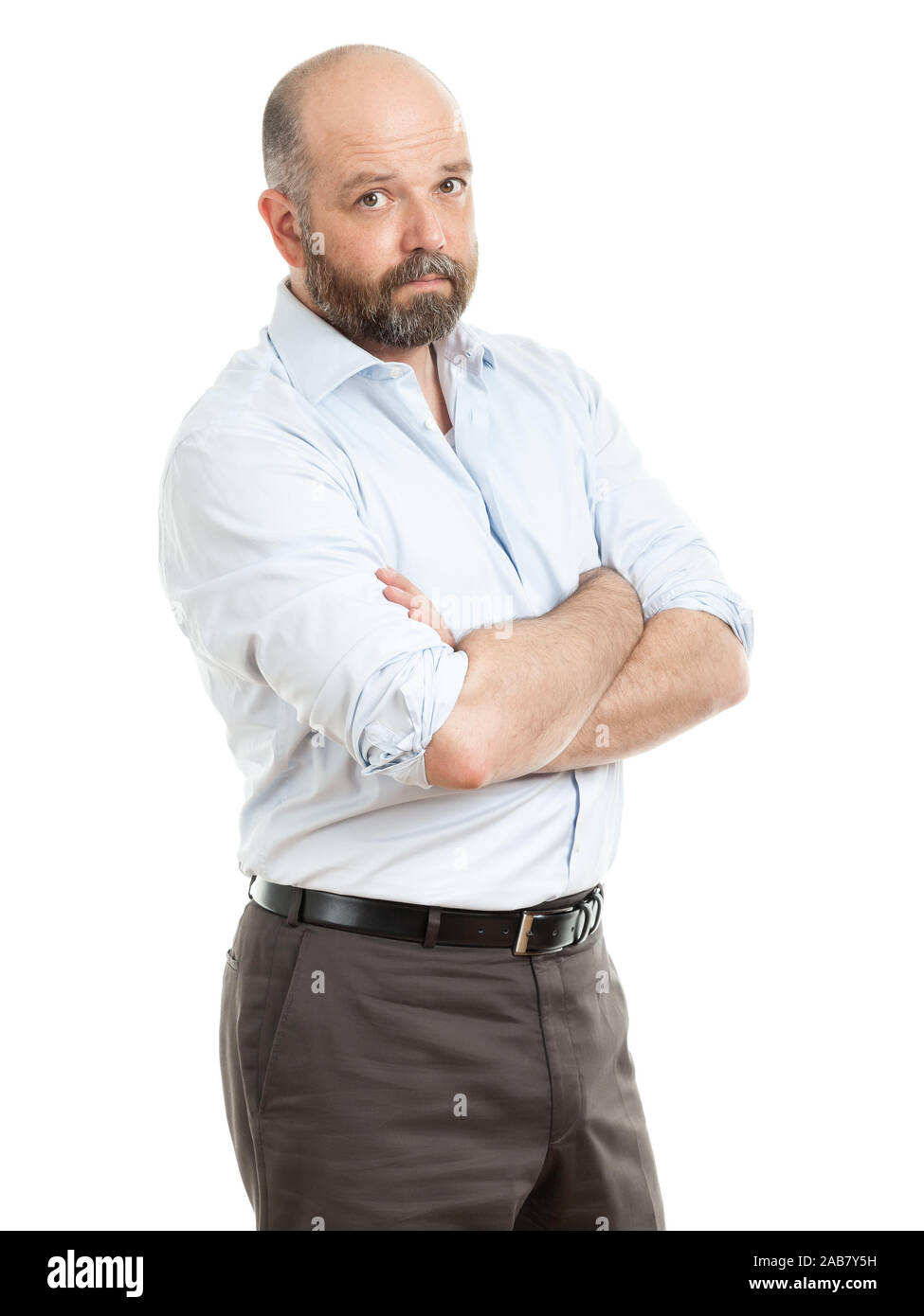 Ein motivierter Geschaeftsmann vor weissem Hintergrund Stock Photo