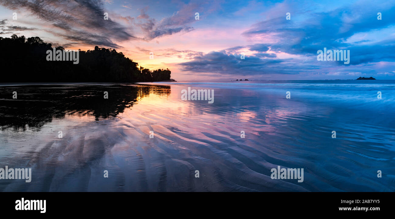 Sunrise at Playa Arco Beach, Uvita, Marino Ballena National Park, Puntarenas Province, Pacific Coast of Costa Rica, Central America Stock Photo