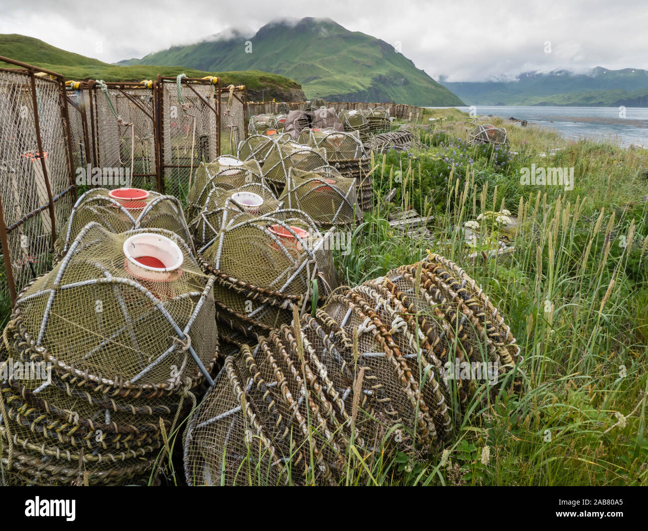 Crab fishing pots being stored at the dock in Dutch Harbor in the community of Unalaska, Alaska, North America Stock Photo