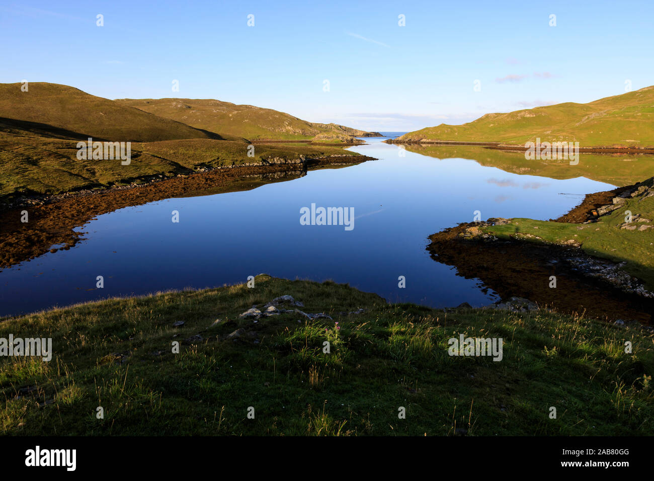 Mavis Grind, early morning reflections, narrow isthmus between North Sea and Atlantic Ocean, Shetland Isles, Scotland, United Kingdom, Europe, Europe Stock Photo