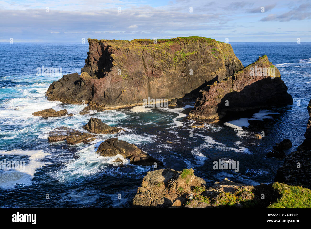 Frothy seas around Moo Stack, Eshaness, jagged cliffs and stacks, Northmavine, Shetland Isles, Scotland, United Kingdom, Europe Stock Photo