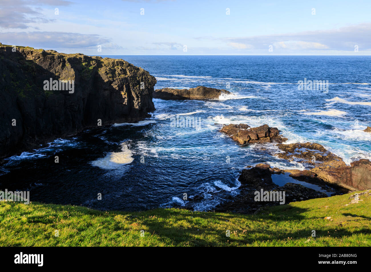 Frothy seas, Eshaness, jagged cliffs, stacks, geos and blow holes, Northmavine, Shetland Isles, Scotland, United Kingdom, Europe Stock Photo
