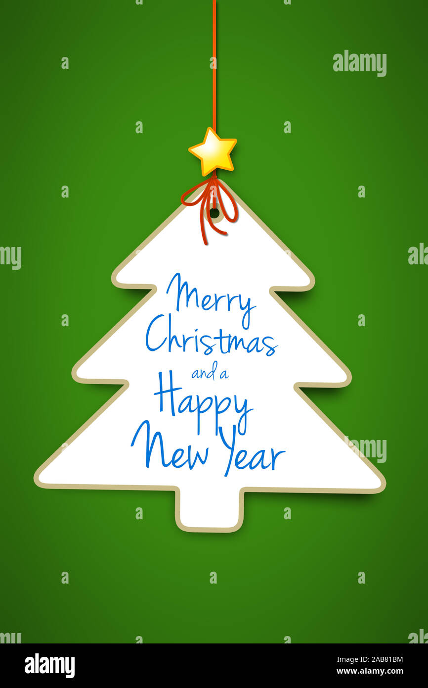 Ein dekorativer Weihnachtsbaum vor gruenem Hintergrund Stock Photo