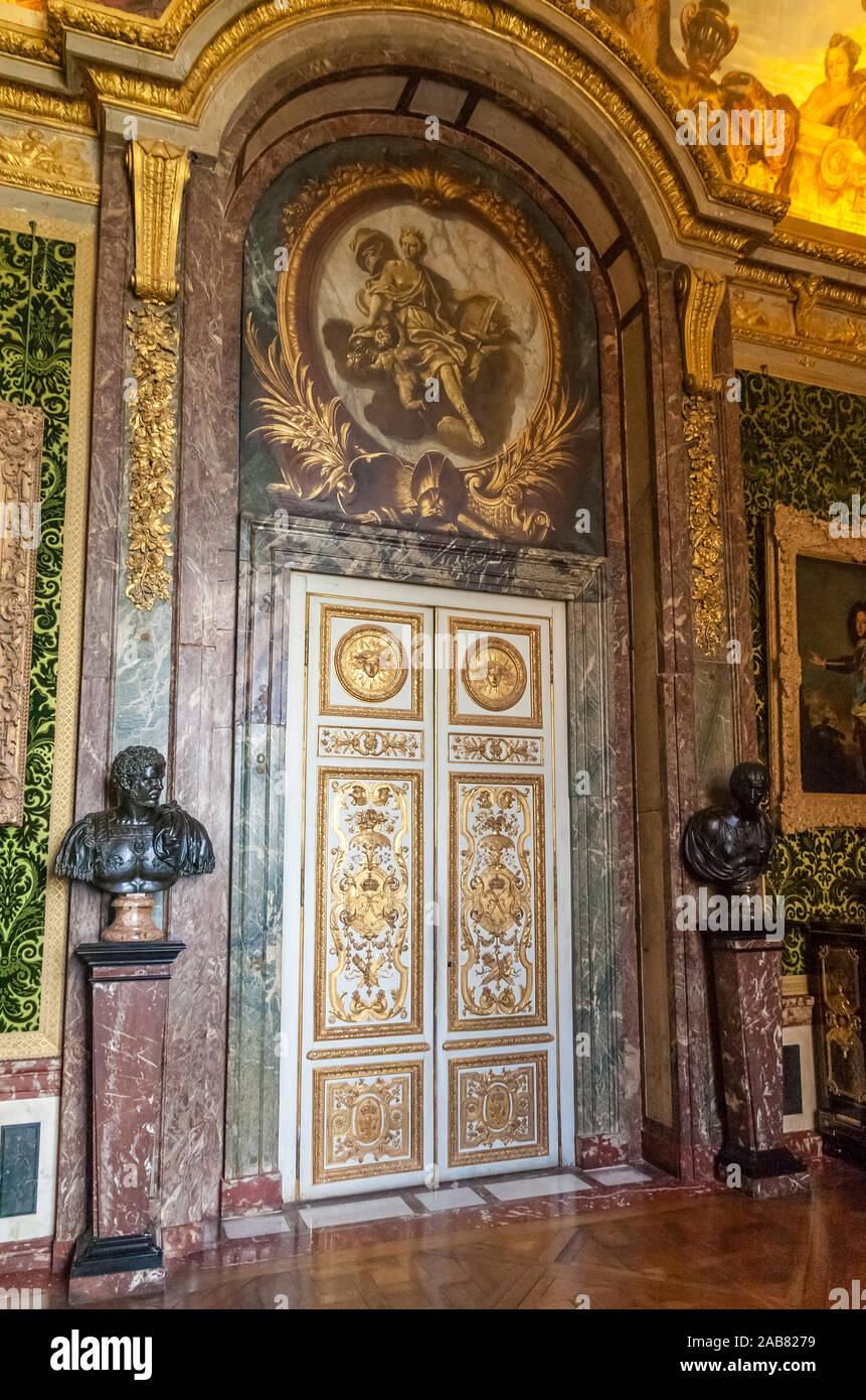 Nice close-up view of the elaborate ornate gilded door in the Salon of Abundance, served as a refreshment room where coffee, wines and liqueurs were... Stock Photo