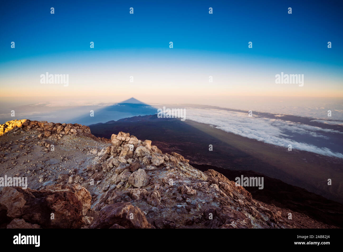 View of El Teide Volcano shadow from the summit at sunrise, El Teide National Park, UNESCO, Tenerife, Canary Islands, Spain, Atlantic, Europe Stock Photo