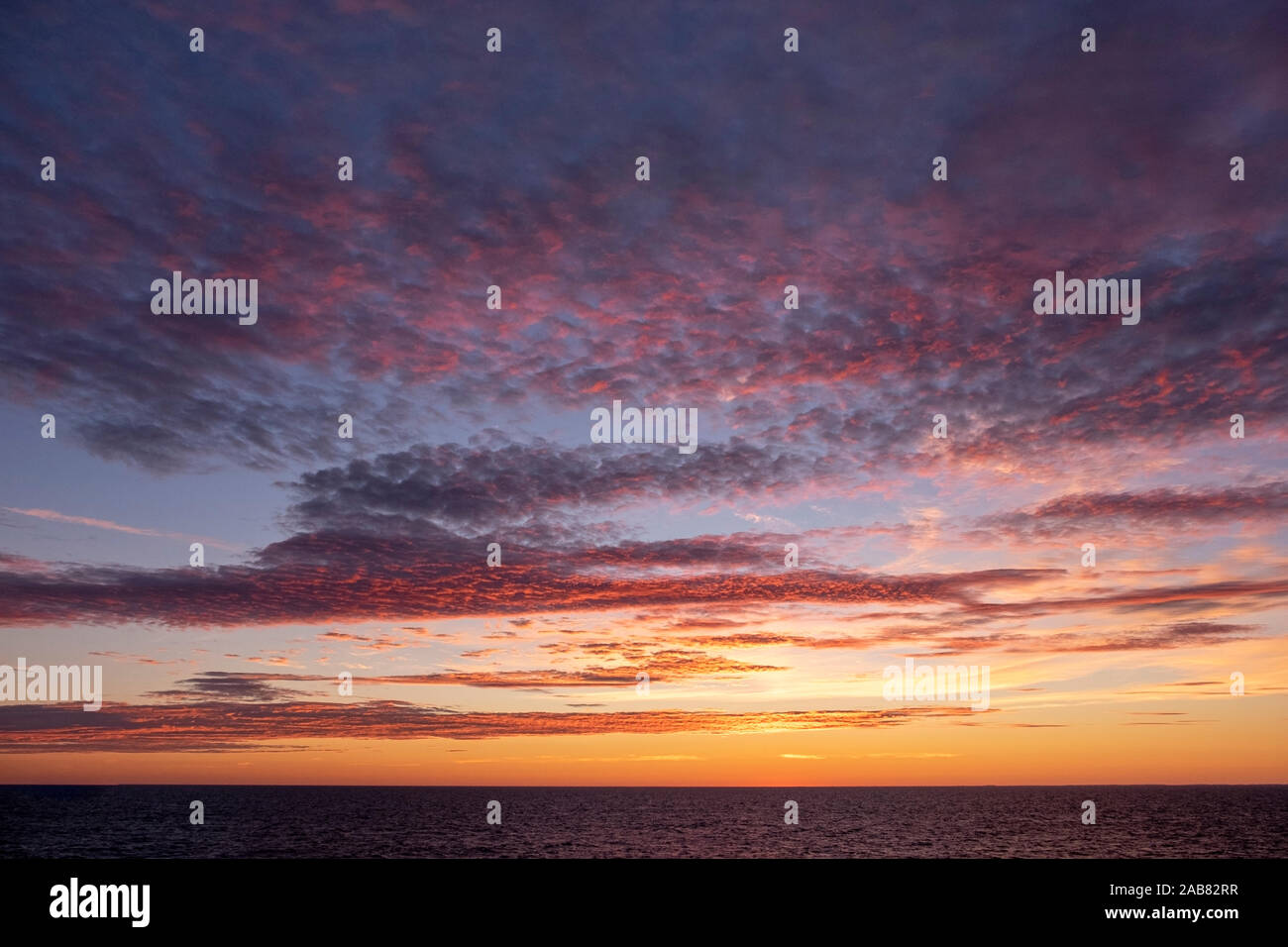 Sun setting over Baltic Sea, Atlantic Ocean, Russia, Europe Stock Photo