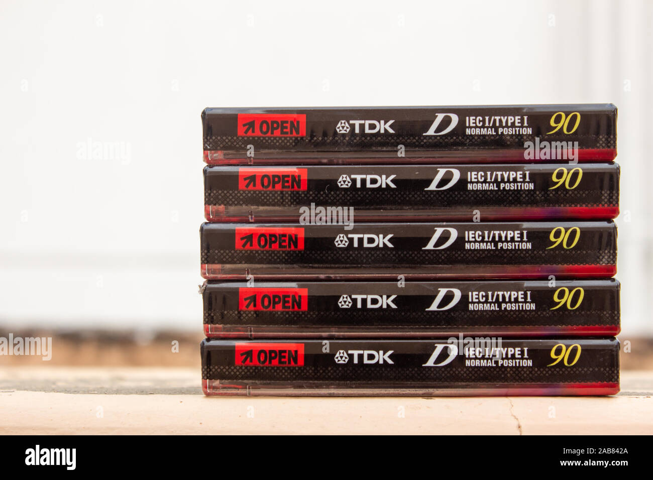 Salem, Tamil Nadu / India - November 24 2019 : Unopened TDK D90 audio cassettes photographed with a blurry background. Stock Photo