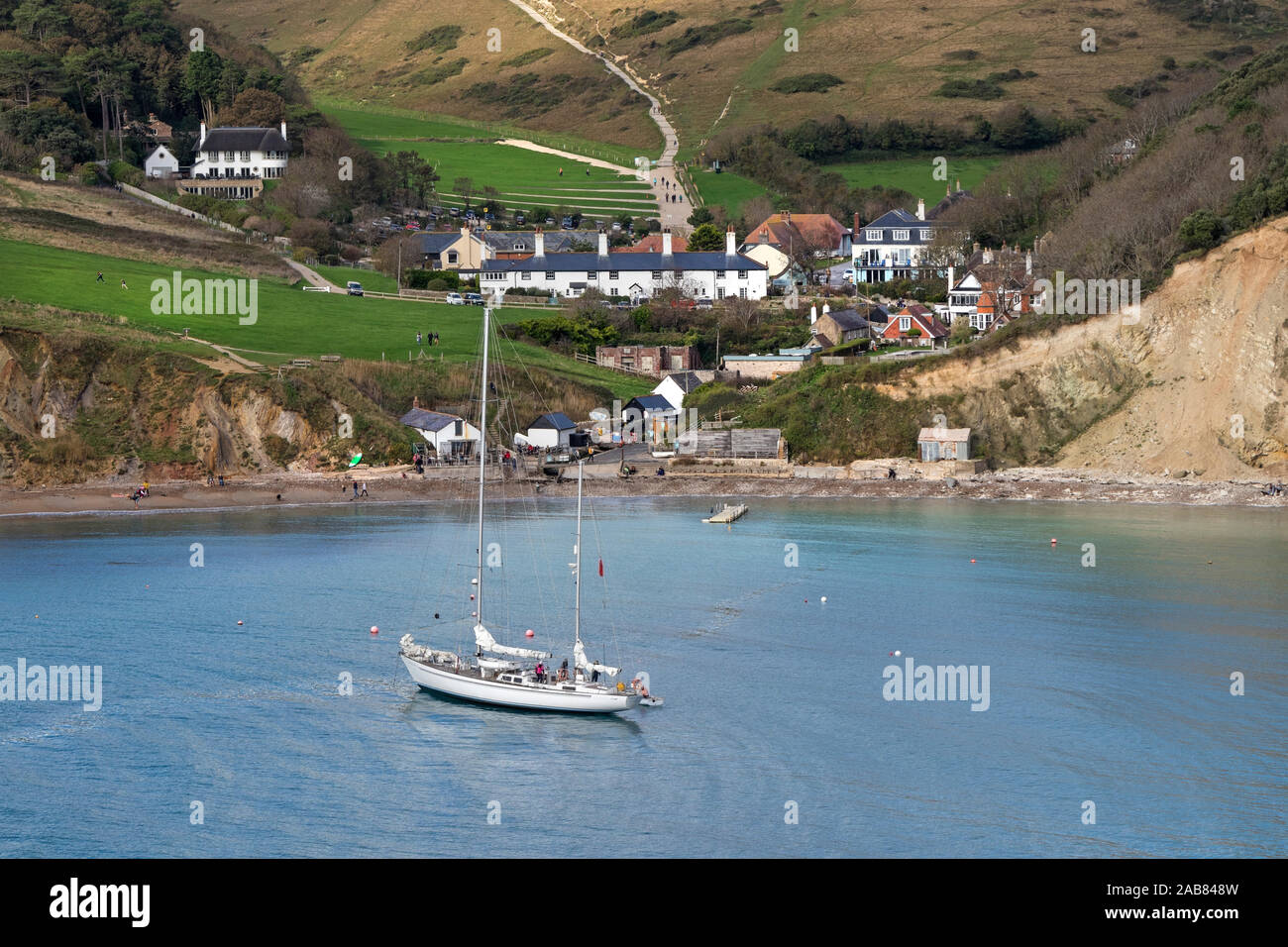 The Sailing Yacht, Donald Searle, Moored in Lulworth Cove, Dorset, UK Stock Photo