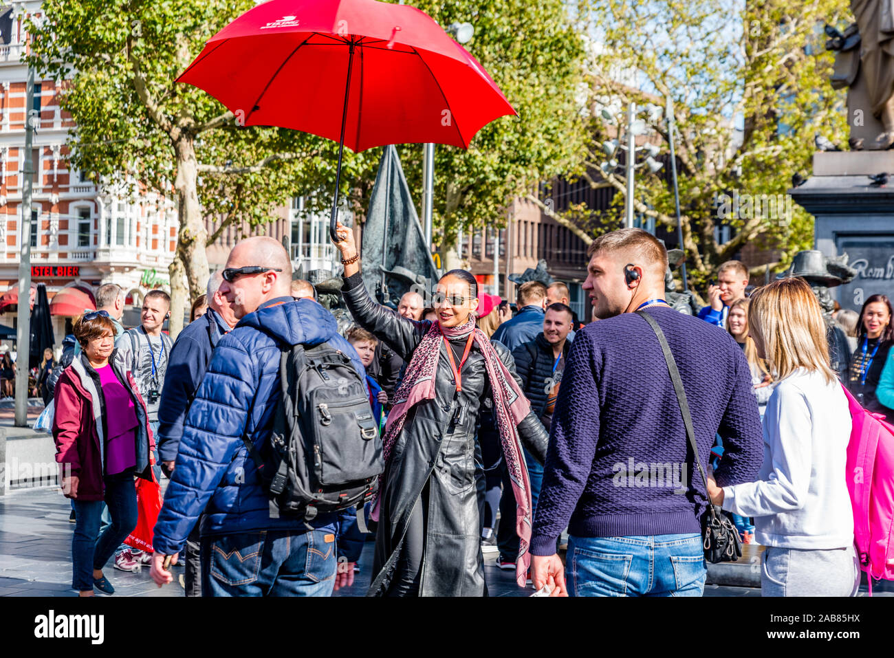 red umbrella tour guide