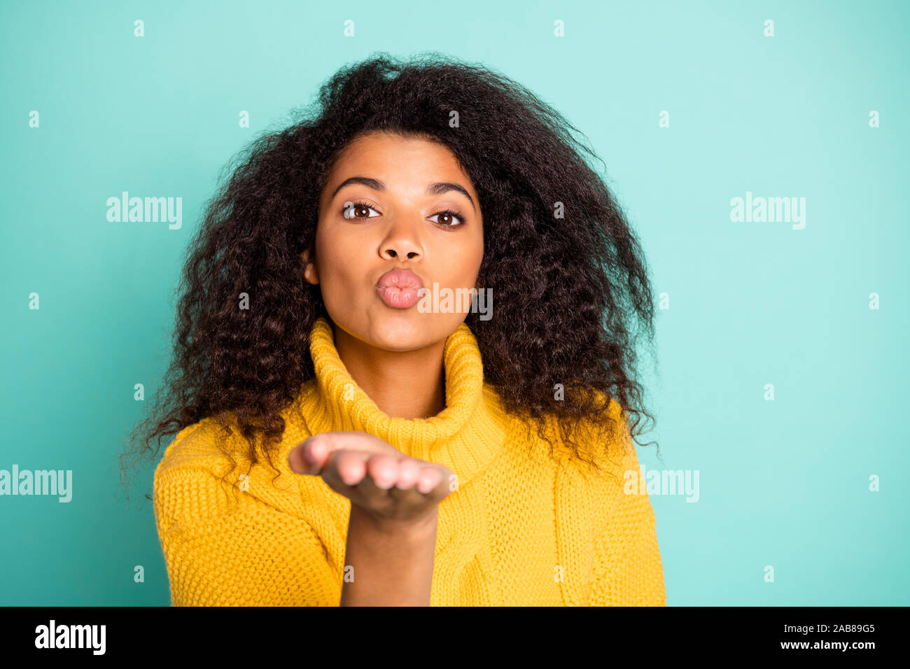 Close Up Photo Of Pretty Dark Skin Feminine Lady Holding