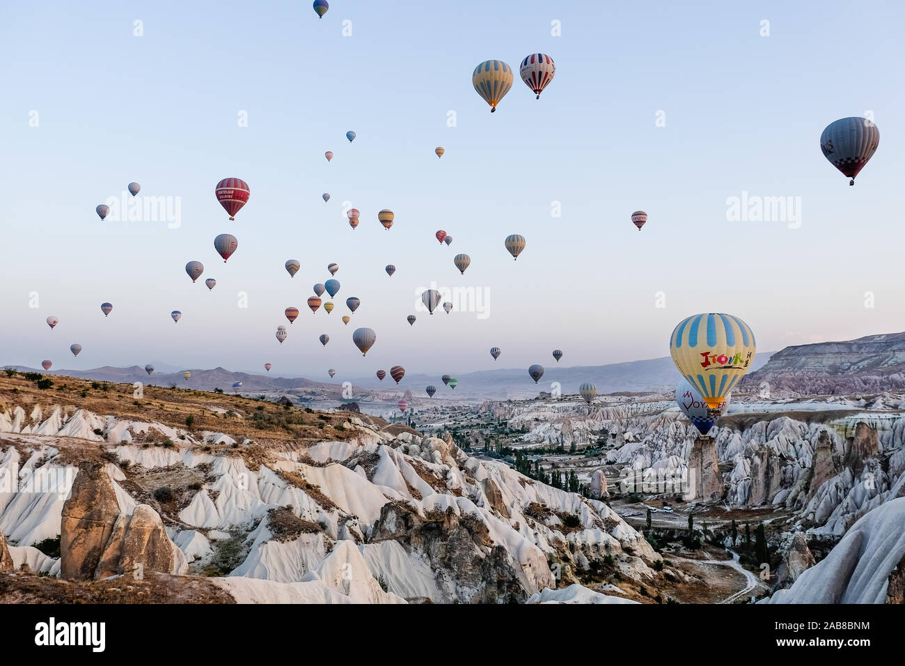 Morning hot air balloons over Cappadocia valley Stock Photo