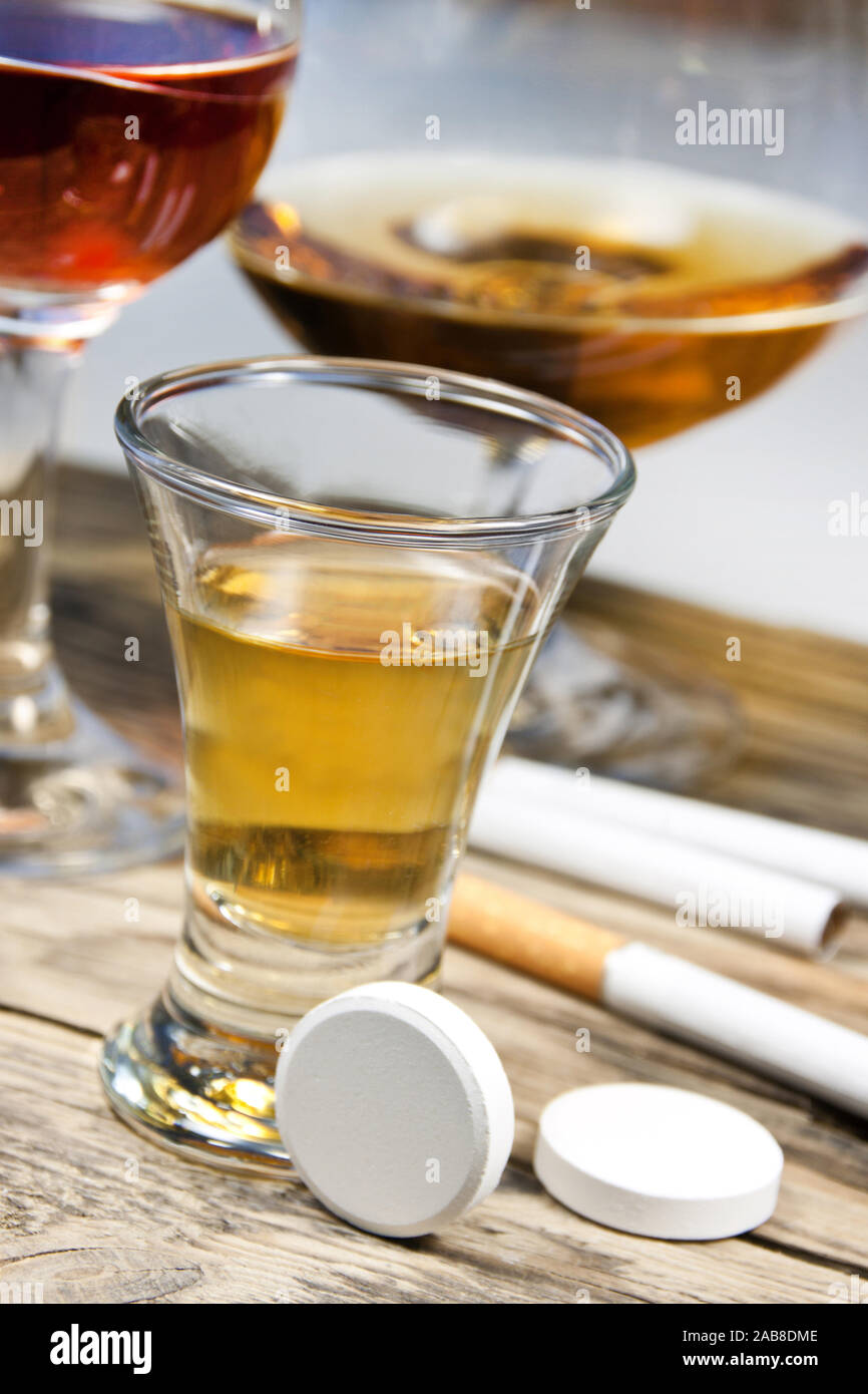 Cigarettes, alcohol and medicaments Stock Photo