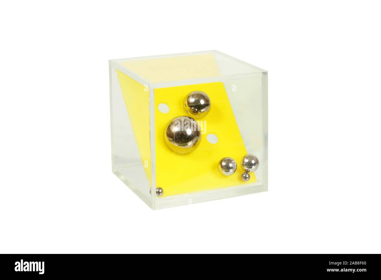 Balls and holes puzzle isolated on white background Stock Photo Alamy