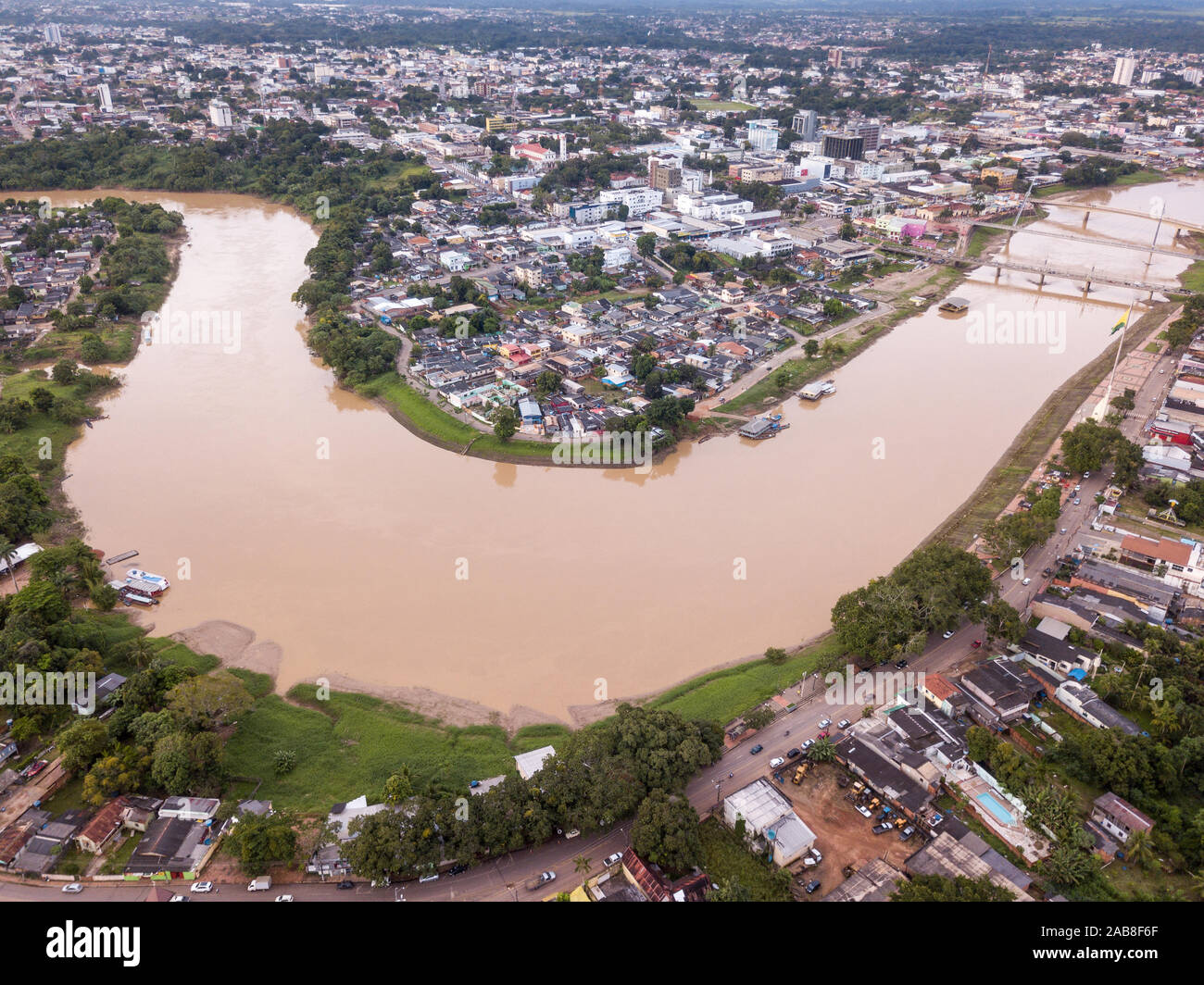 Aerial drone view of Acre river in the amazon and Rio Branco city center  buildings, streets, bridges on cloudy winter day. Concept of environment  Stock Photo - Alamy