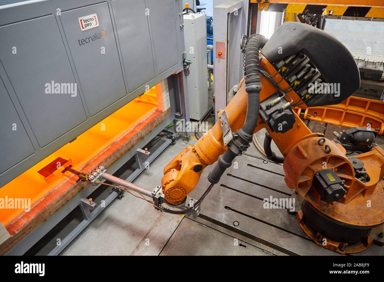 Robot that introduces materials in the oven and later takes them to the press, Hot stamping cell, Industry Unit, Automotive Industry, Technology Stock Photo