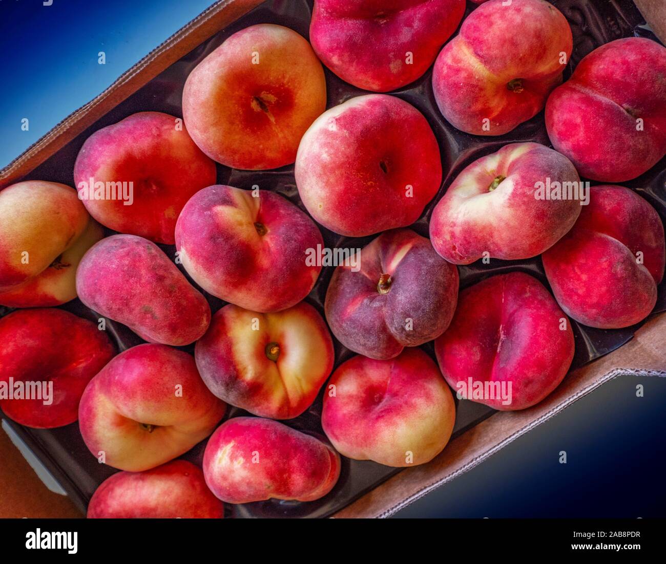 '''Galaxy'' white flat peaches. Stock Photo