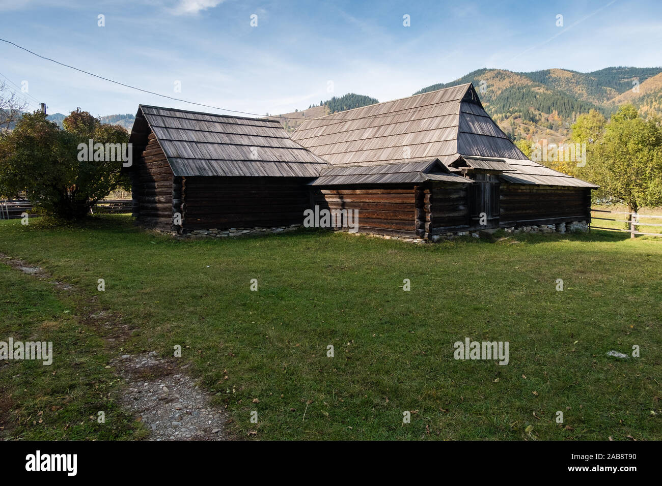 Old Grazhda Hut - typical for Galicia type of homestead, when residential and commercial premises are interconnected and closed rectangular courtyard, Stock Photo