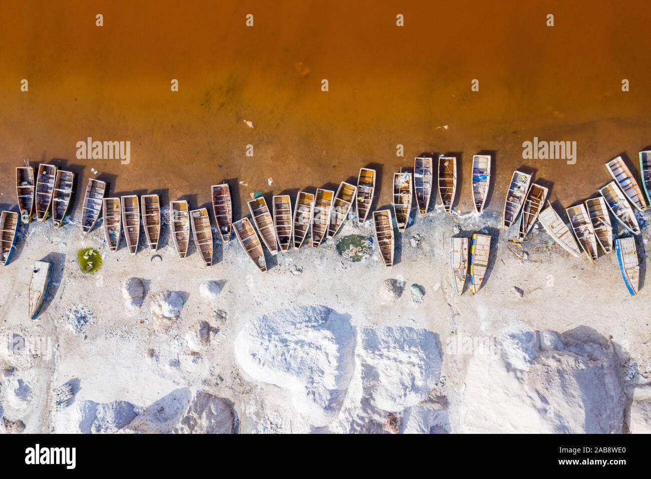 Aerial view of the Pink Lake Retba or Lac Rose in Senegal. Photo made by drone from above. Africa Natural Landscape. - Stock Image