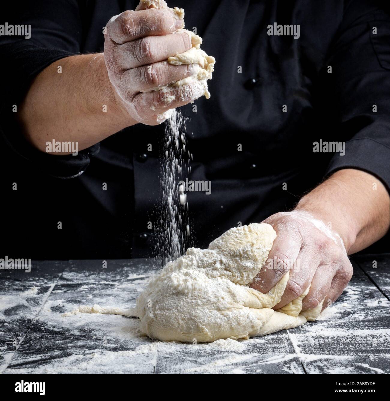 Hands Kneading Dough Flour High Resolution Stock Photography and Images Alamy