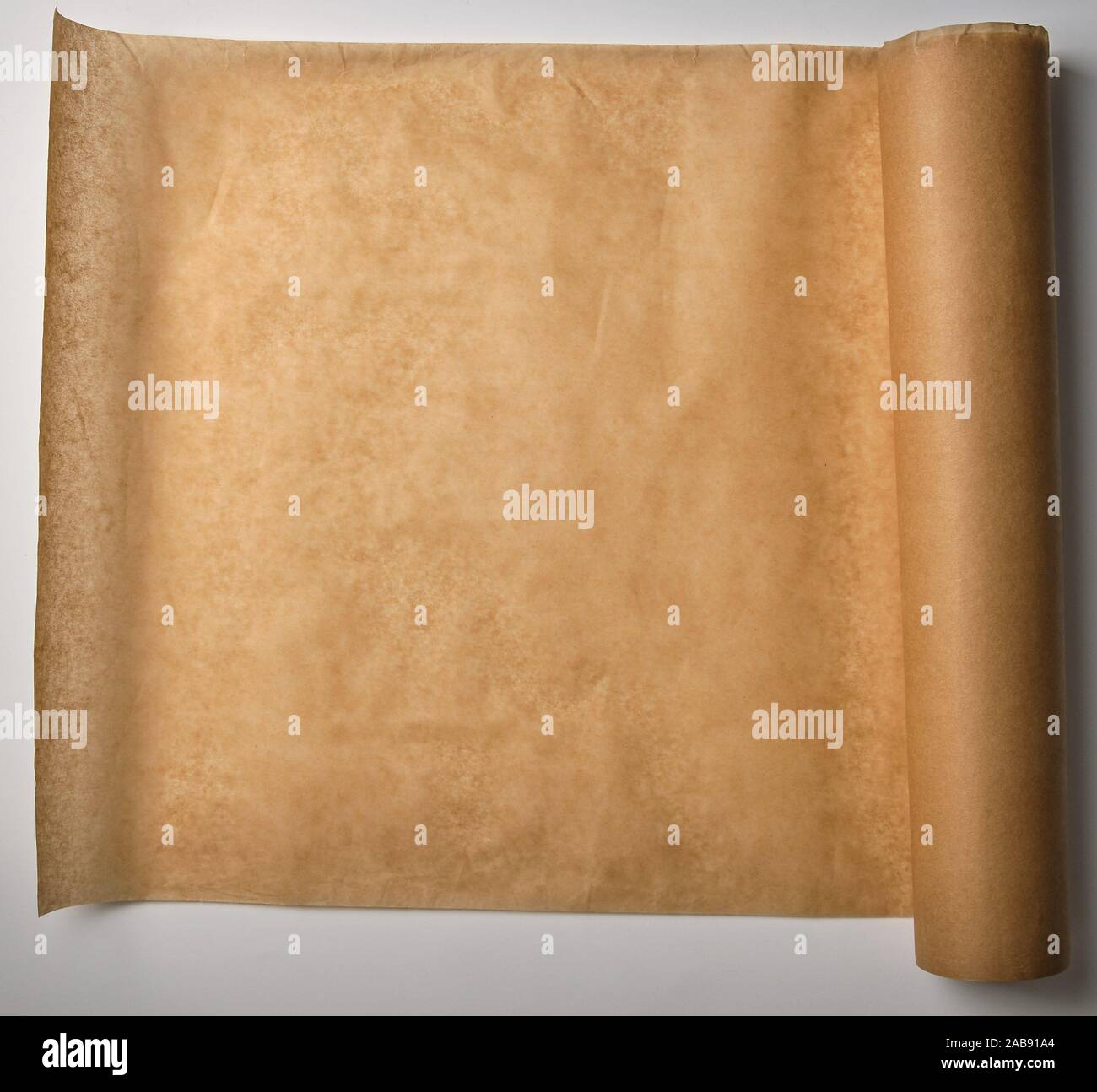 https://c8.alamy.com/comp/2AB91A4/brown-parchment-baking-paper-wound-into-a-large-roll-top-view-2AB91A4.jpg