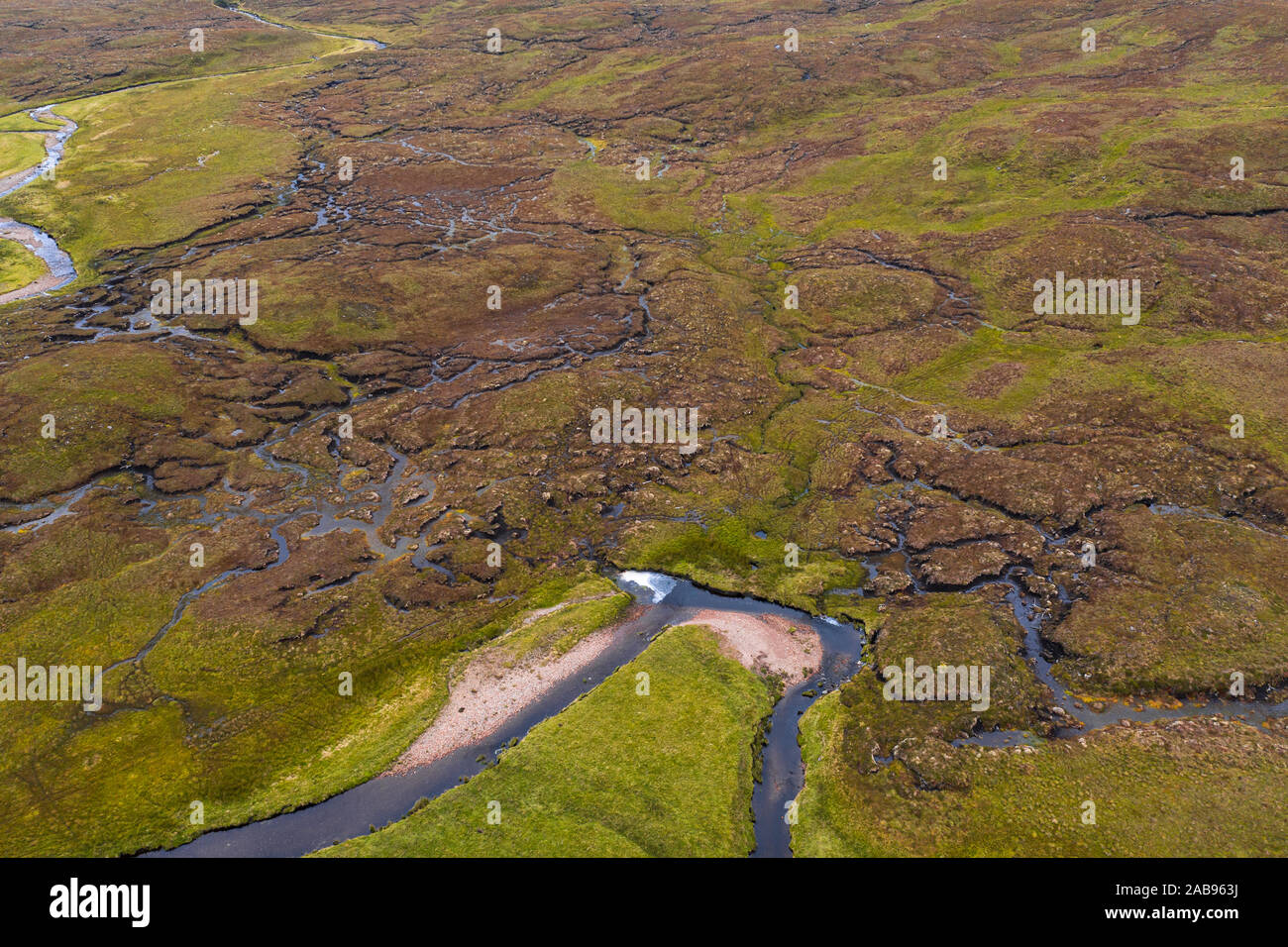Top down drone shoot capturing rich texture of wetland near Feinmore in the Northwest Highlands in Scotland  - NC500 Route Stock Photo