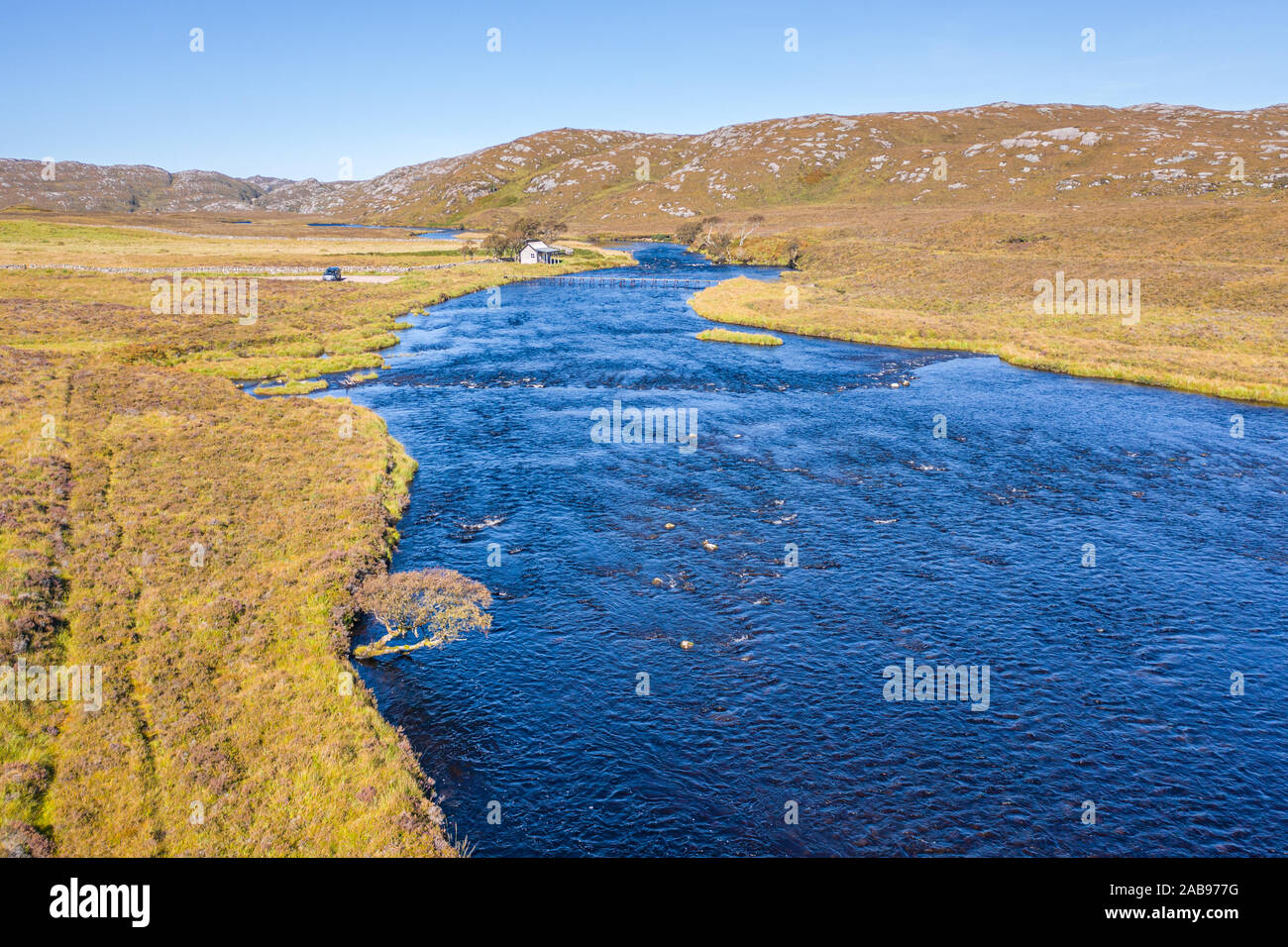 Low altitude drone shoot over River Laxford famous salmon fly fishing location in the North West Highlands of Scotland - NC500 Route Stock Photo