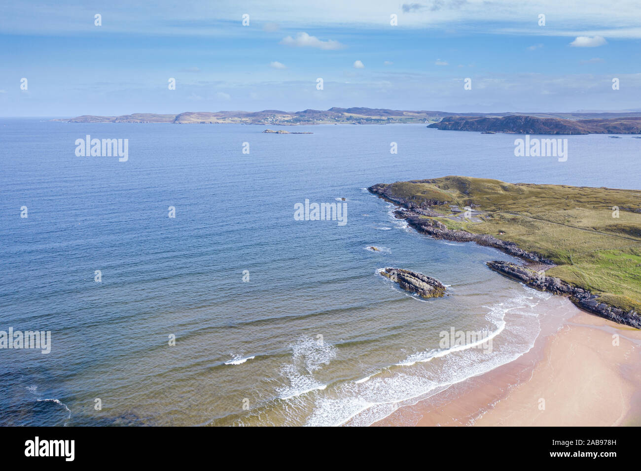 High altitude drone view over Firemore Beach looking towards Island of Ewe in the Northwest Highlands of Scotland - NC500 route Stock Photo