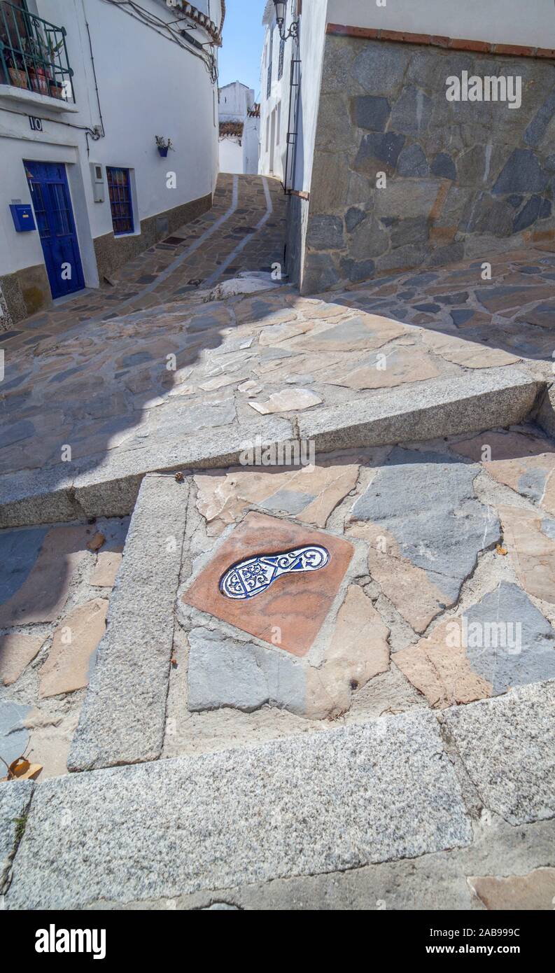 The Footsteps of History, Ceramic tile footprint used to show visitors the best route to take around the village of Comares, Axarquia District, Stock Photo
