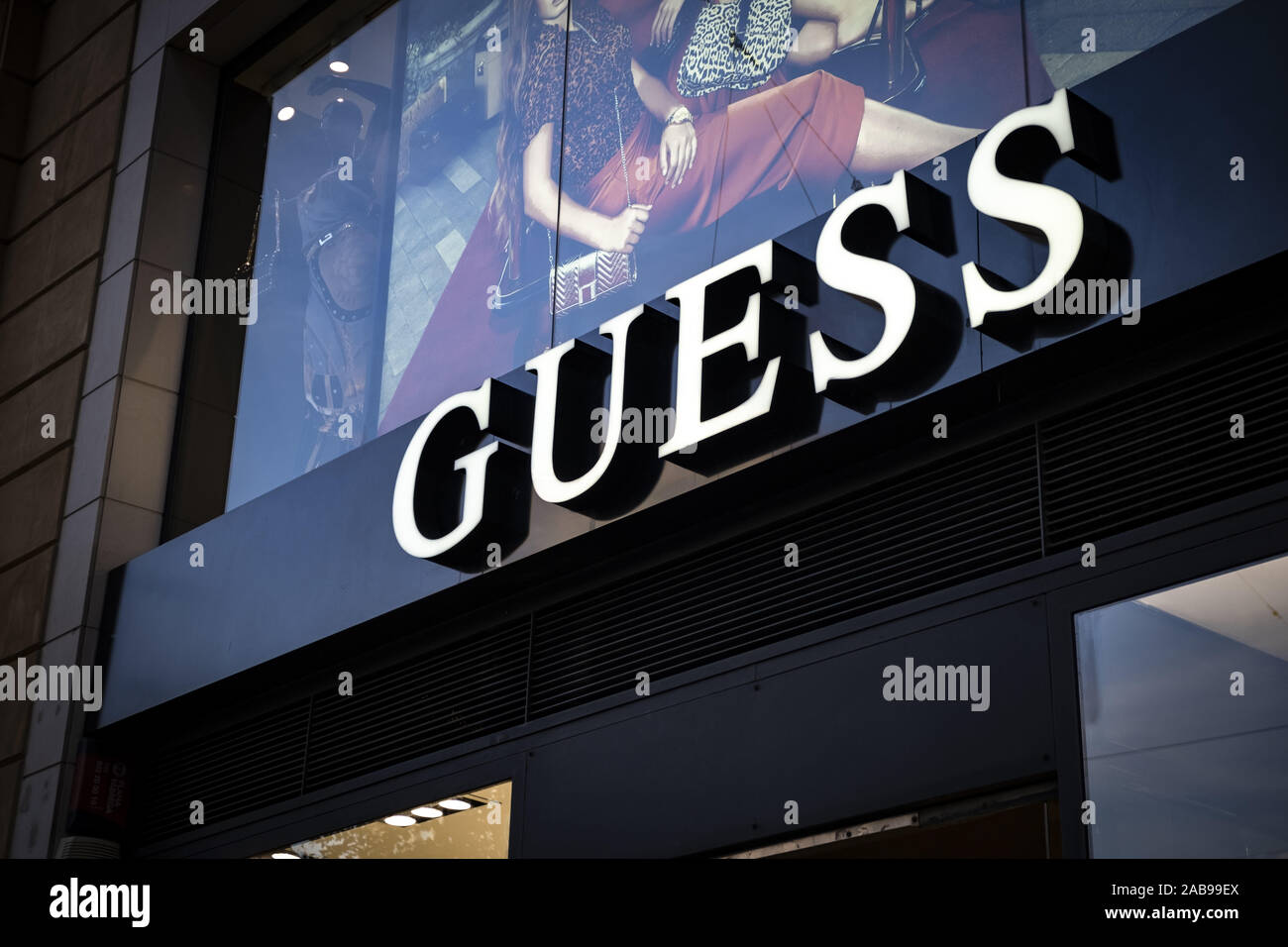 Barcelona, Catalonia, Spain. 25th Nov, 2019. The GUESS logo, Italian brand  of luxury clothing and accessories manufacturer, seen at the Passeig de GrÃ  cia store.A boulevard of just over a kilometre, the