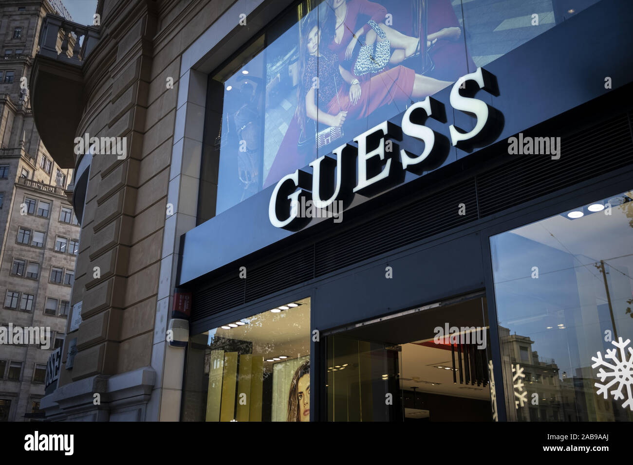 November 25, 2019, Barcelona, Catalonia, Spain: The GUESS logo, Italian  brand of luxury clothing and accessories manufacturer, seen at the Passeig  de GrÃ cia store..A boulevard of just over a kilometre, the