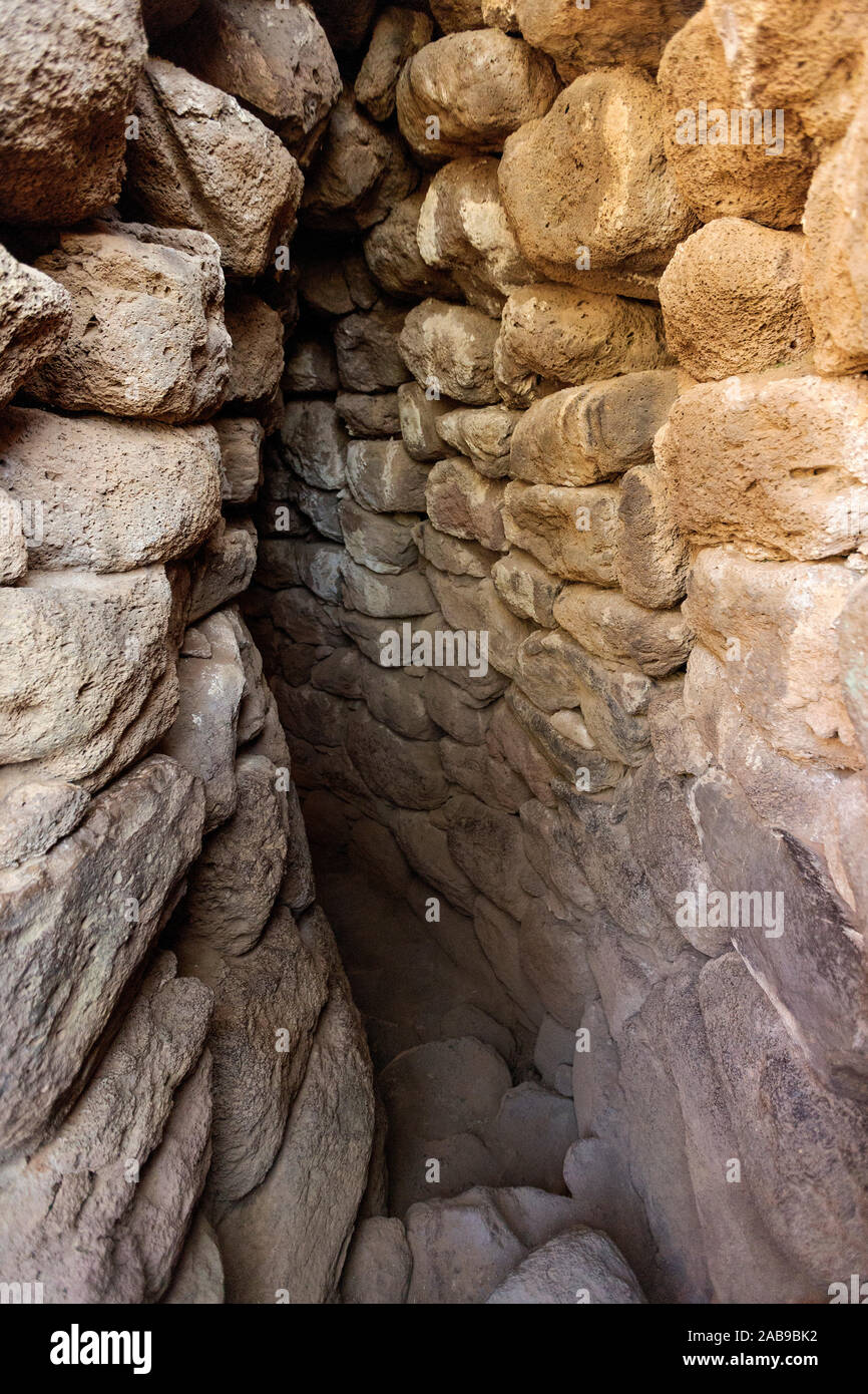 Interior of one Nuraghe in the ancient Nuragic village near Paulilatino, Oristano, Sardinia, Italy. Stock Photo