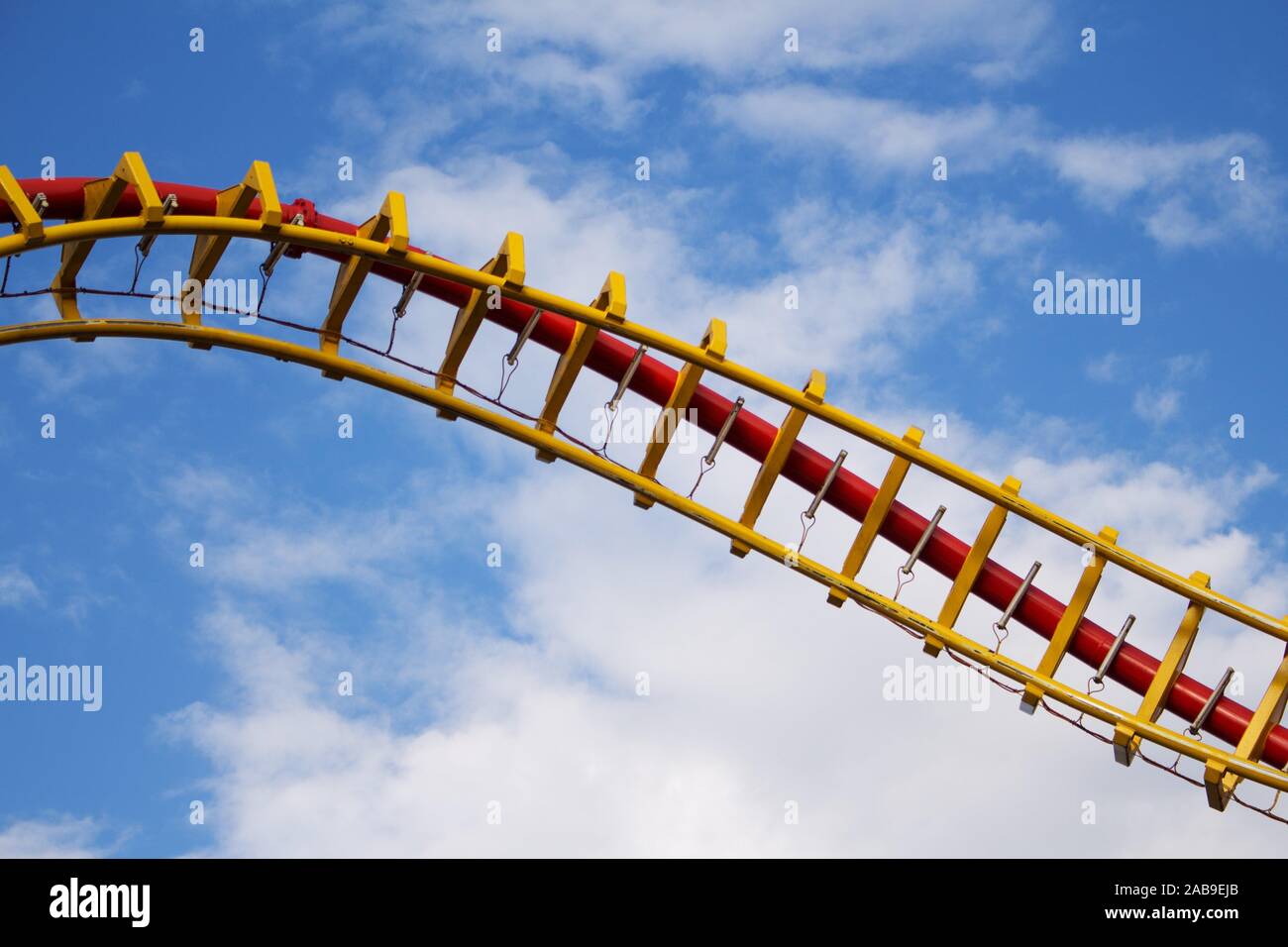 Roller Coaster Ride in Amusement Park. Entertainment and Adventure. Stock Photo