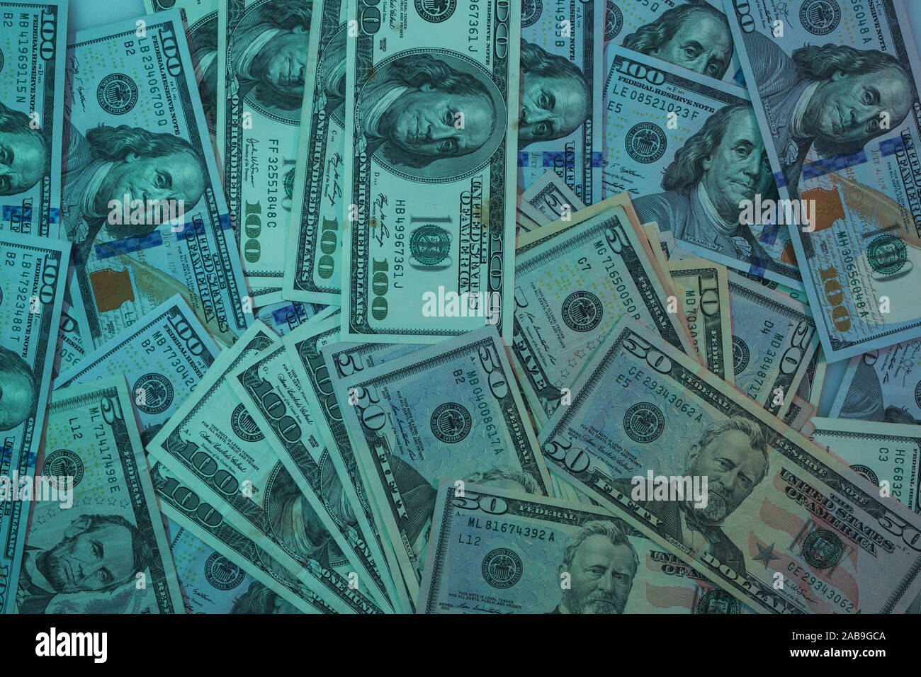 Beautiful Dollars on a table night background. American, US Dollars Cash Money. One Hundred Dollar Banknotes. Stock Photo