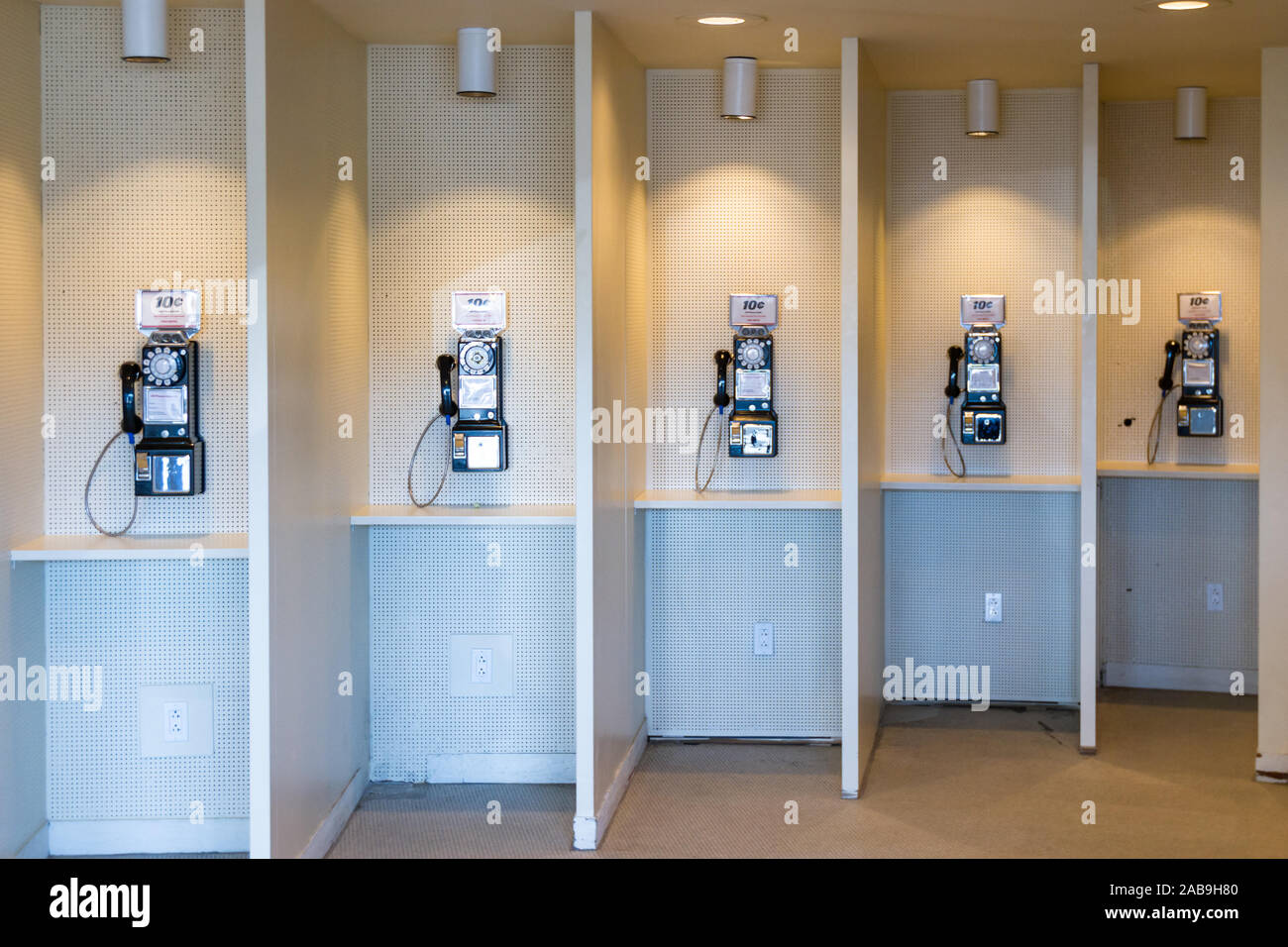 JFK Airport, Queens NY September 03 2019 Retro style payphone with a price tag of 10 cents at