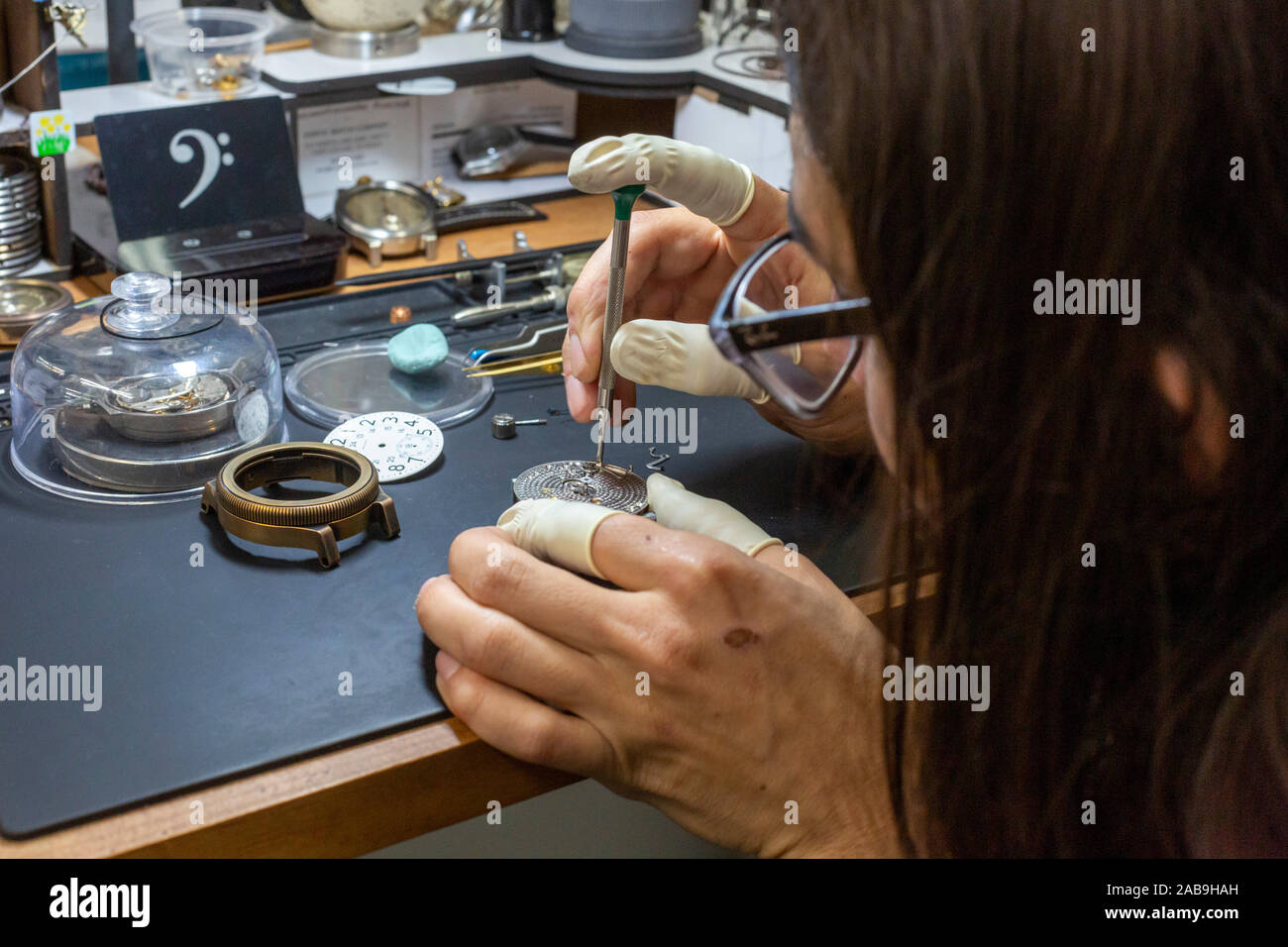 Fort Collins - Derek Crane builds watches at the Vortic Watch Company. The company salvages and restores antique pocket watches, making them into expe Stock Photo