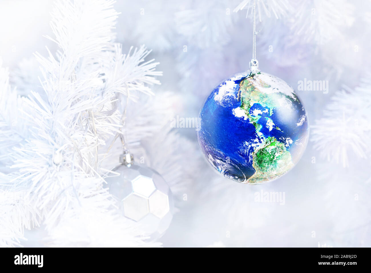 close up decorated Earth ornament on white christmas tree with blurred background, Gift earth a great christmas concept, Elements of this image furnis Stock Photo