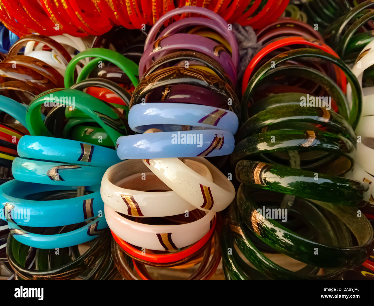 Colorful thik and thin indian  culture Glass Bangles variety. Stock Photo