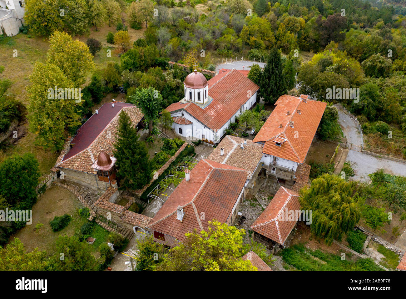 Monastery of St. Nicholas the Wonderworker in Arbanassi, near Veliko Tarnovo, Bulgaria. Aerial drone shot Stock Photo