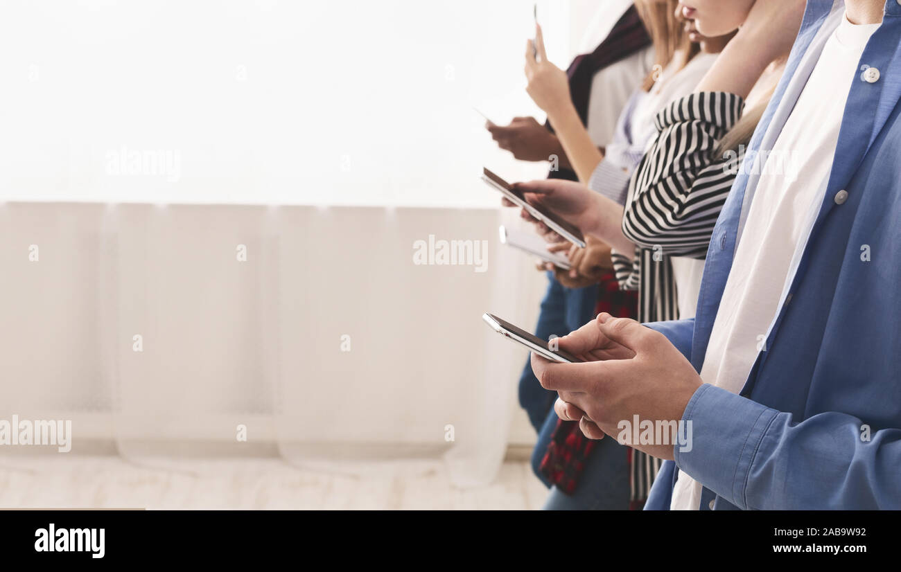 Picture of Technology addiction. Teenagers using smartphones, free space Stock ...
