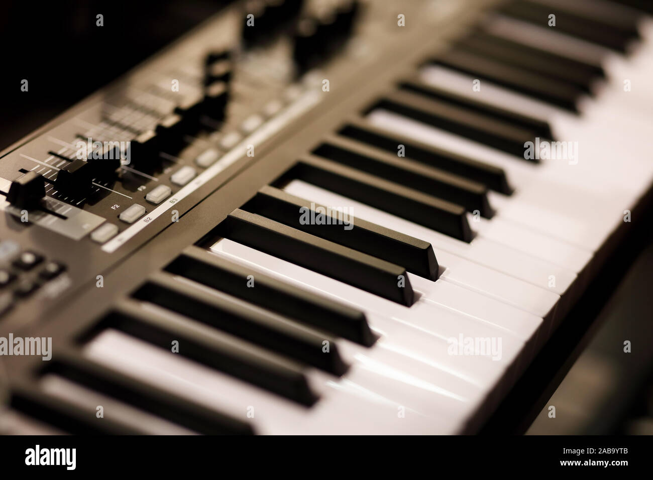 Piano keys of electronic synthesizer close up. Selective focus. Stock Photo