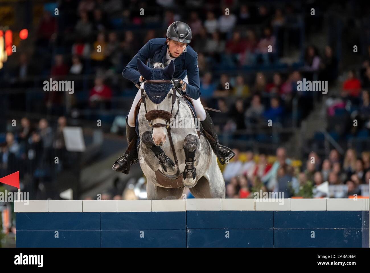 STUTTGART, GERMANY - NOVEMBER 17: Martin Fuchs (SUI) riding Silver Shine at the Stuttgart German Master 2019 - Longines FEI Jumping World Cup 2019/2020, Int. Jumping competition with jump-off - Grand Prix of Stuttgart presend by Mercedes-Benz, Walter solar and BW-Bank at the Hans-Martin-Schleyer-Halle on November 17, 2019 in Stuttgart, GERMANY. Stock Photo