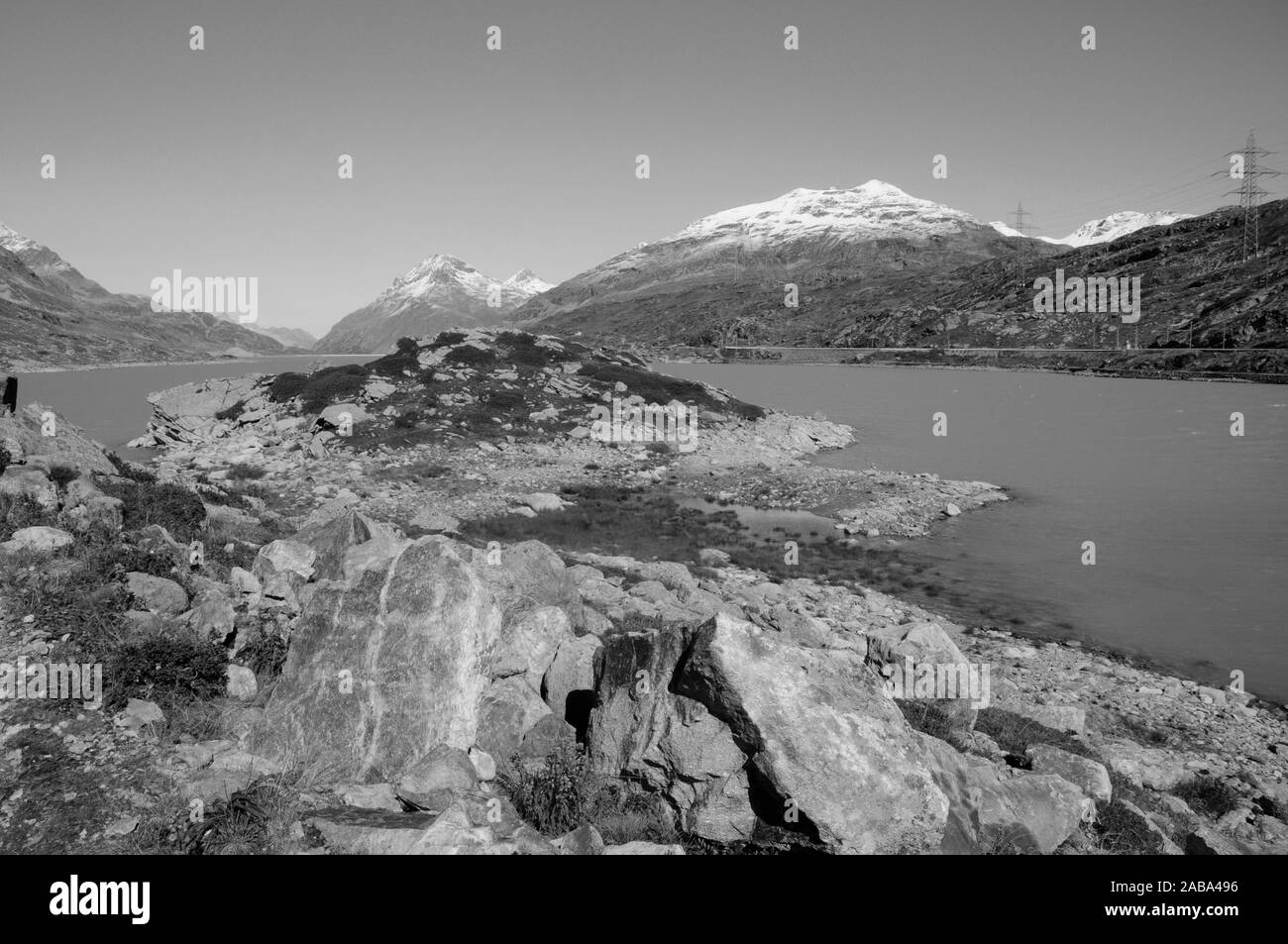 Switzerland: Mountain-Trekking in the Swiss Alps at the glacier Lake Bianco on the Bernina Hospitz. Stock Photo