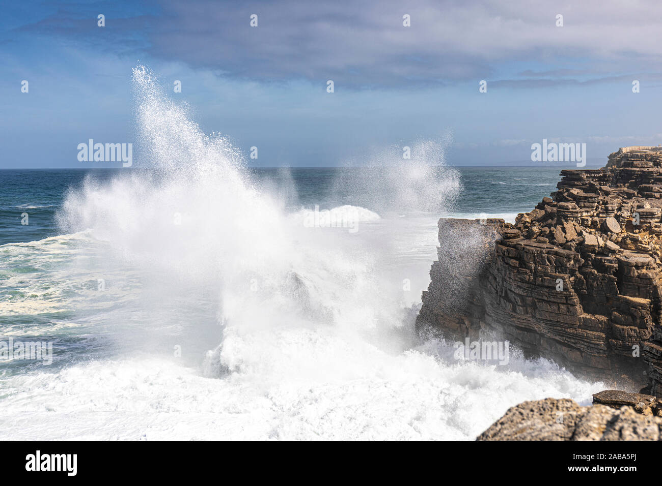 Breaking Atlantic swell hitting the cliffs at Peniche, Portugal Stock Photo