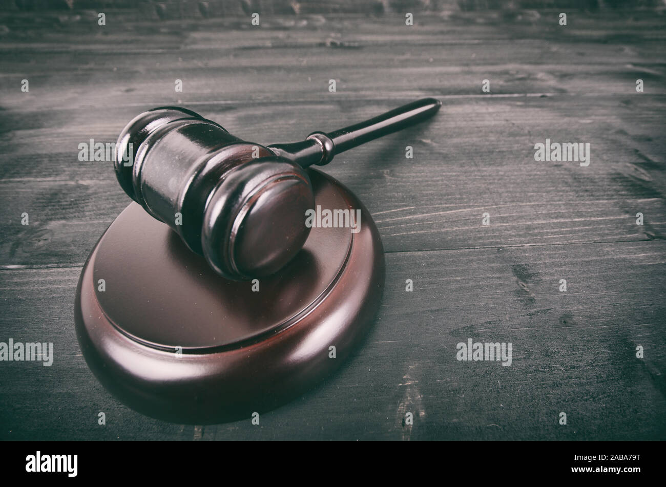 Law and Justice, Legality concept, Judge Gavel on a black wooden background. Stock Photo