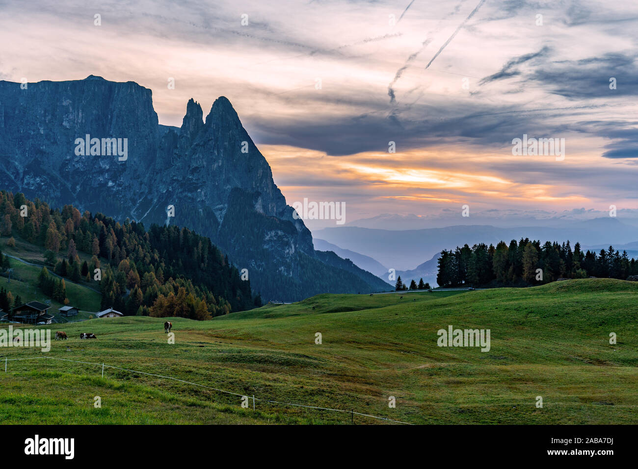 Sunset at the Seiser Alm and the Schlern mountains in South Tyrol on a bright autumn evening Stock Photo
