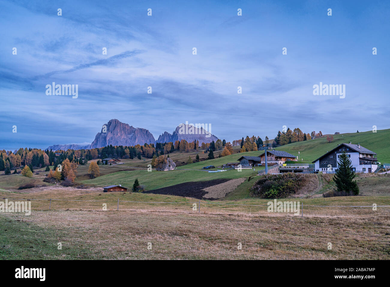 Panoramic view of the Seiser Alm and the Schlern mountains in South Tyrol on a bright autumn evening Stock Photo